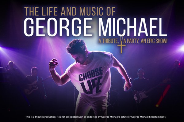 A George Michael tribute performer dances on stage in white clothing. 